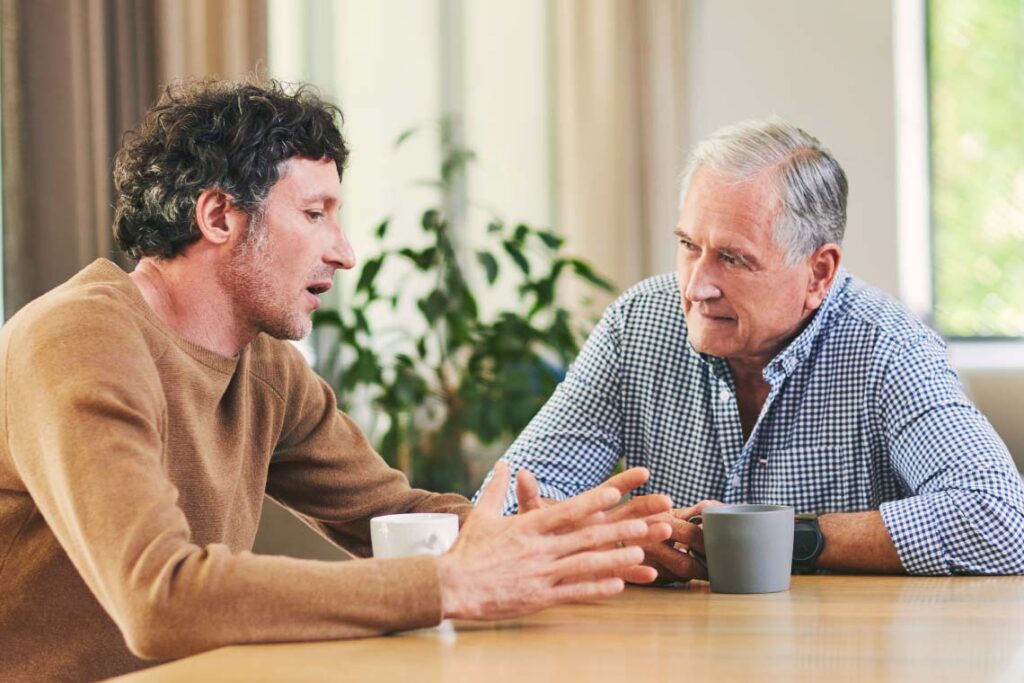 Two men talking